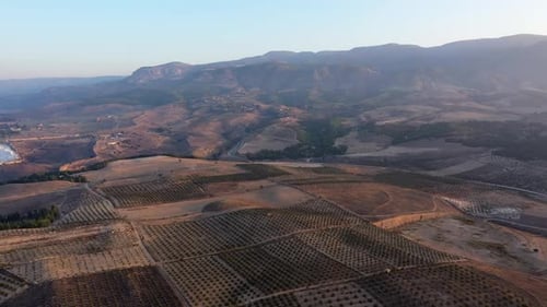 Drone View of Beautiful Agricultural Landscape with Mountains and Farmland