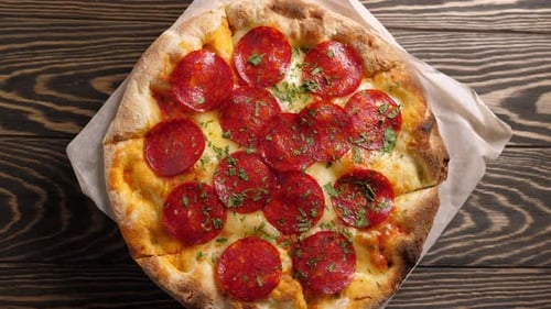 Delicious Pepperoni Pizza on Wooden Table