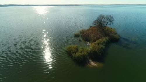 Aerial View of a Blue Lake with an Island