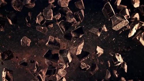 Chunks of Dark Chocolate Floating
