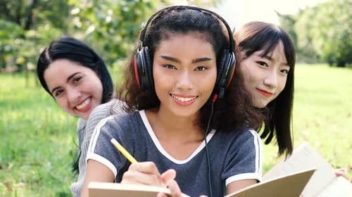 Group of Three Diversity University Student Friends at Educational Campus