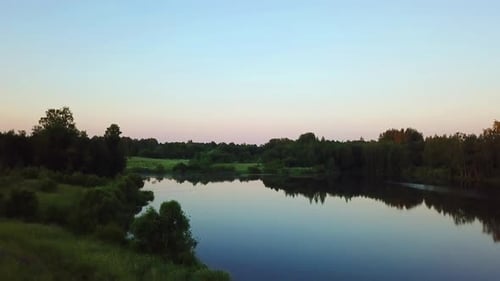 Aerial View of Serene Lake at Sunset