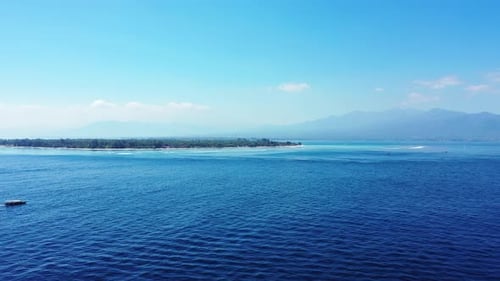 Tropical flying abstract view of a summer white paradise sand beach and turquoise sea background in