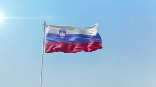 Slovenia National Flag Waving in Clear Blue Sky