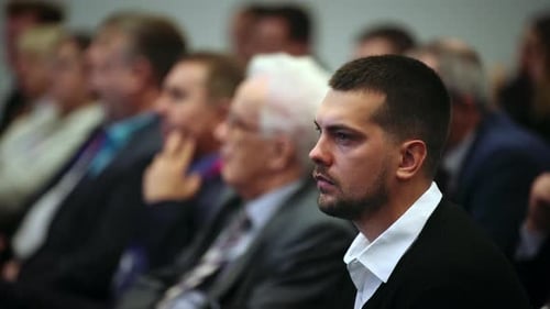 Attentive Audience Listening at Corporate Presentation