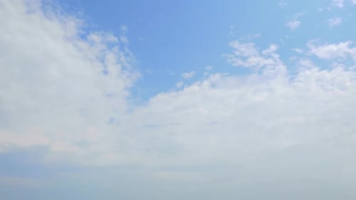 Time lapse of white cloud moving pass around sky background