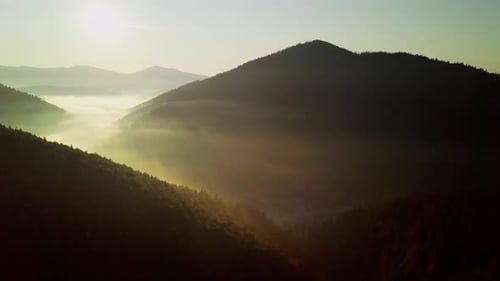 Mountain Peaks and Morning Sky with Smooth Moving Clouds