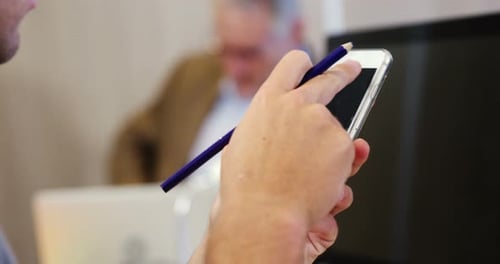 Businessman using mobile phone