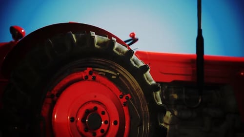 Animated Red Tractor Wheel and Engine Close-up
