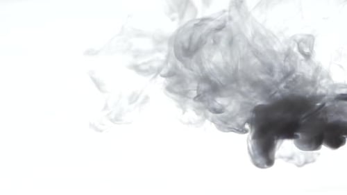 Billowing Grey Smoke on Bright White Background