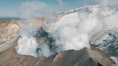 Birds View Smoking Active Crater of Volcano Epic Panorama Landscape Terrain