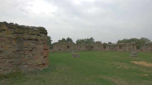 A Ruined Wall Made of Bricks and Stones