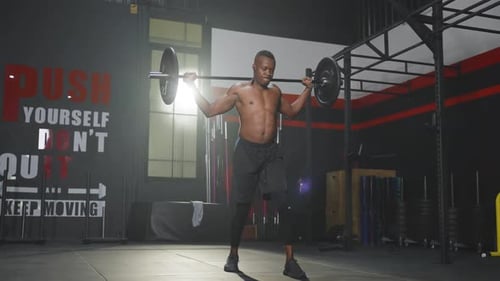 Active African american Sport man workout exercising to maintain muscle in fitness or gym.