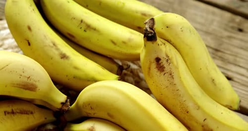 Vibrant Yellow Bananas Displayed in Close Up Detail
