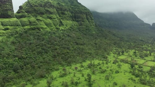 Descending Flight from the mountains to the base into the greens of the western ghats