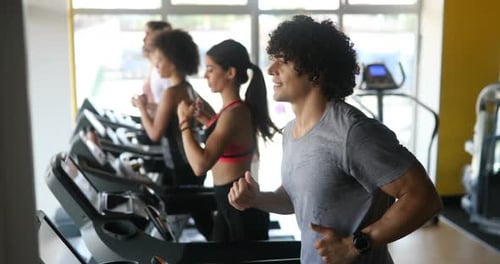 Picture of People Running on Treadmill in Gym