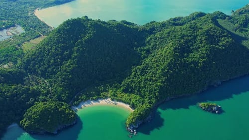 An aerial view of the coast, mountains with many beautiful islands