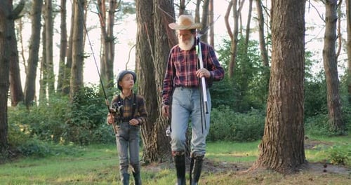 Grandfather and Grandson Fishing in the Woods