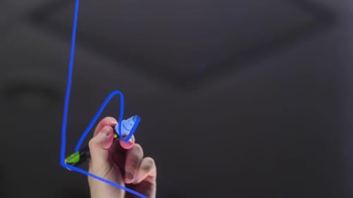 A Man's Hand Draws a Growth Chart