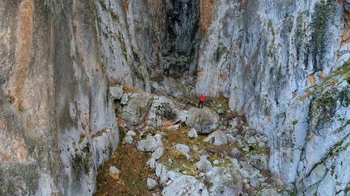 Tourist Hiking In Rock Canyon