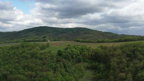 Lush Green Hills and Forests Aerial View