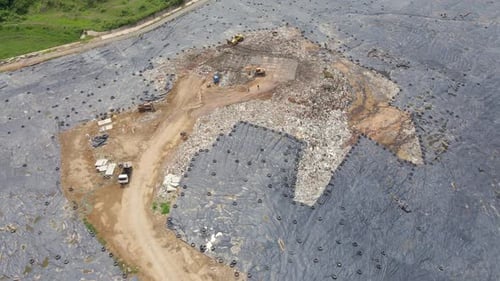 Aerial Top View Video of a Solid Waste Landfill. City Waste Treatment Location. Environmental