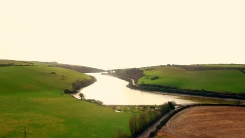 View of beautiful lake and grassland