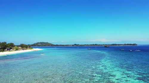 Aerial landscape of beautiful coastline beach vacation by blue ocean and white sand background of a