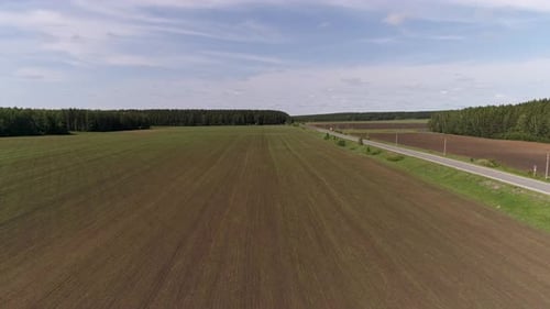 Aerial view of agricultural field near the road