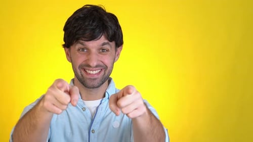 Smiling Excited Man Posing Isolated on Yellow Background Studio