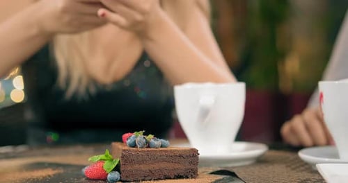 Delicious Brownie with Berries and Coffee at Cafe