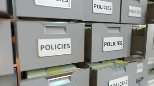 POLICIES Text on the Drawers of a File Cabinet