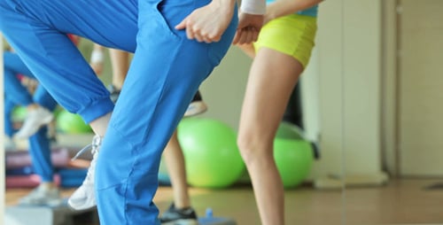 Group Step Aerobics Exercise at the Gym