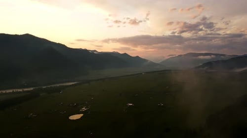 Thick Clouds of Fog in a Mountain Landscape
