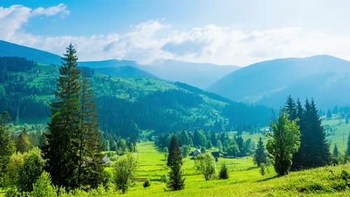 Time Lapse of Blue Sky with Clouds Over Mountain