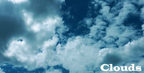 Clouds Drifting in a Bright Blue Sky