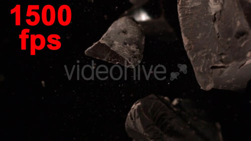 Chunks of Dark Chocolate Floating Slowly