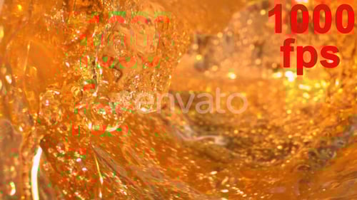 Golden Liquid Sparkling in Abstract Motion