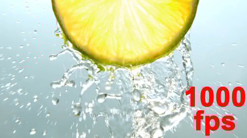 Close-Up of Lime with Water Drizzling