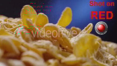 Golden Corn Flakes Against a Blue Background