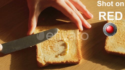 Spreading Butter on Toast with a Knife