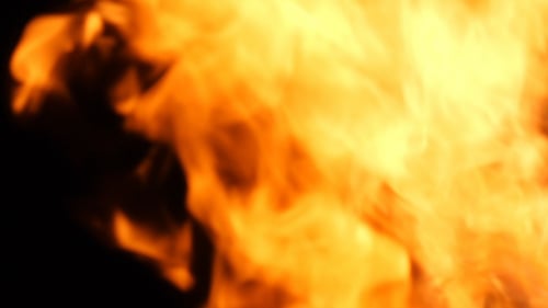 Abstract flames against a black background