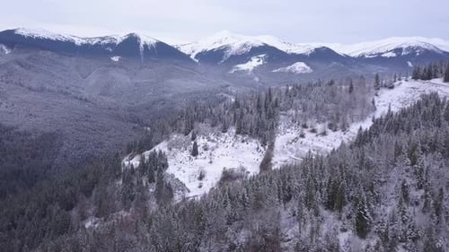 Majestic Snow Covered Mountains Aerial View