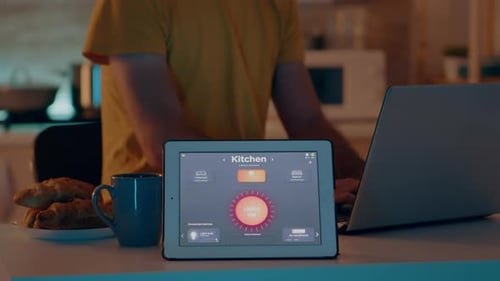 Smart Home Technology Controlling Lights on Tablet