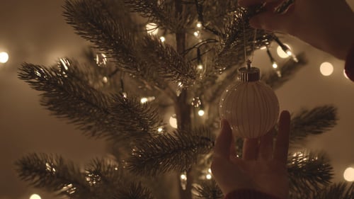 Decorating Christmas Tree with Ornament