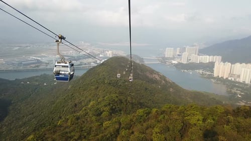 Scenic Aerial View of City and Mountains