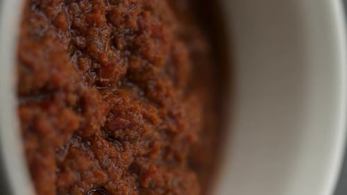 Vertical video: pesto sauce close-up
