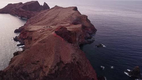 Dramatic Cliffs Meet Deep Blue Ocean, Aerial View