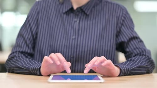 Close Up of Businesswoman Using Tablet