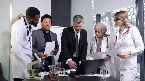 Medical Team Discussing Research Results in Office